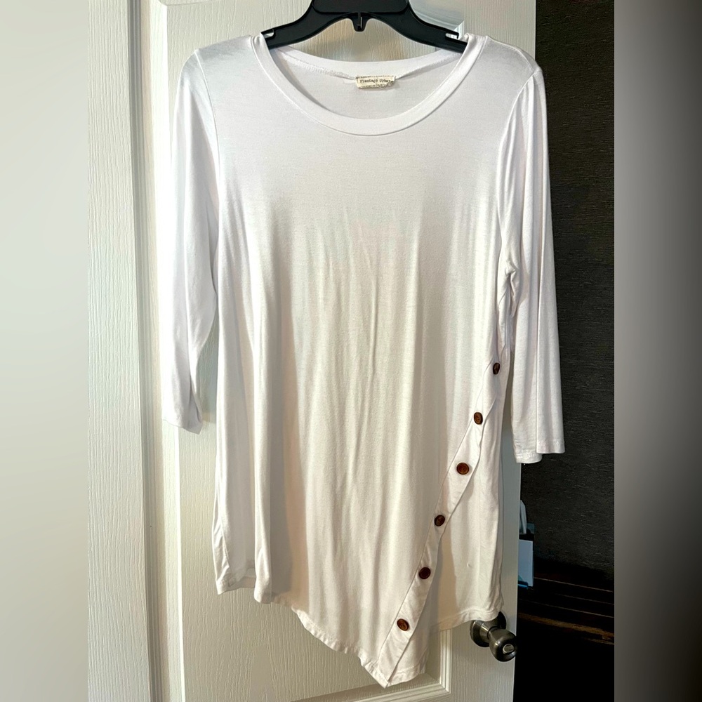 White 3/4 length sleeve top with button accent